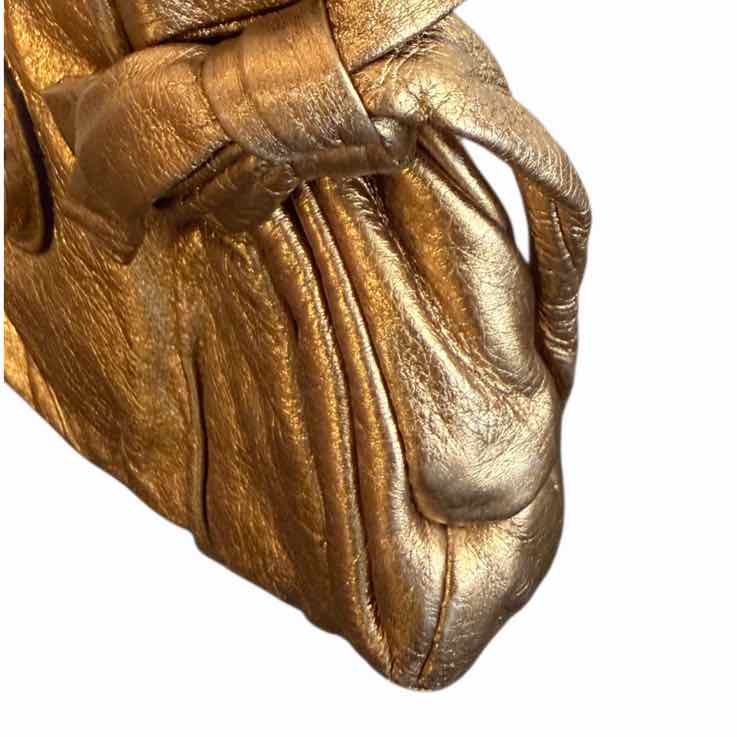 Gucci metallic gold Handbag
