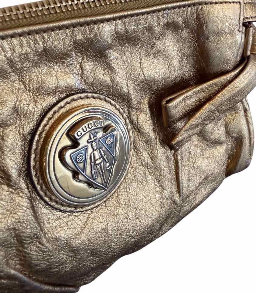 Gucci metallic gold Handbag