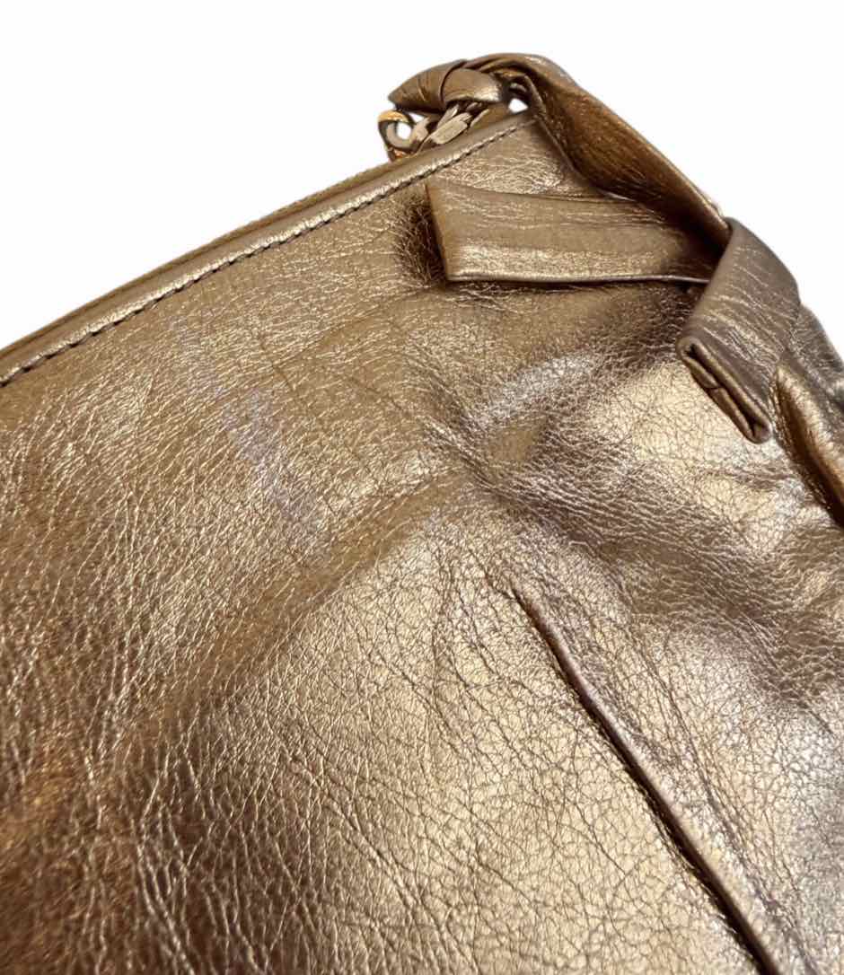 Gucci metallic gold Handbag