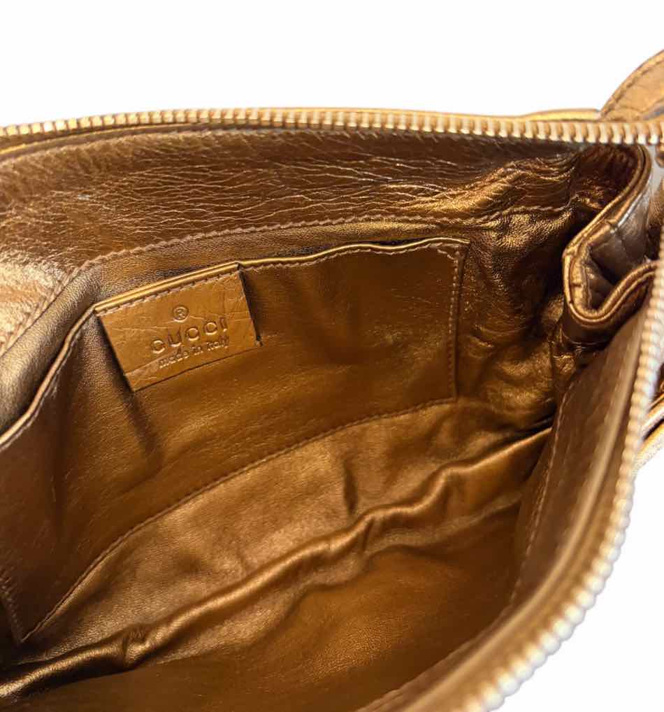 Gucci metallic gold Handbag