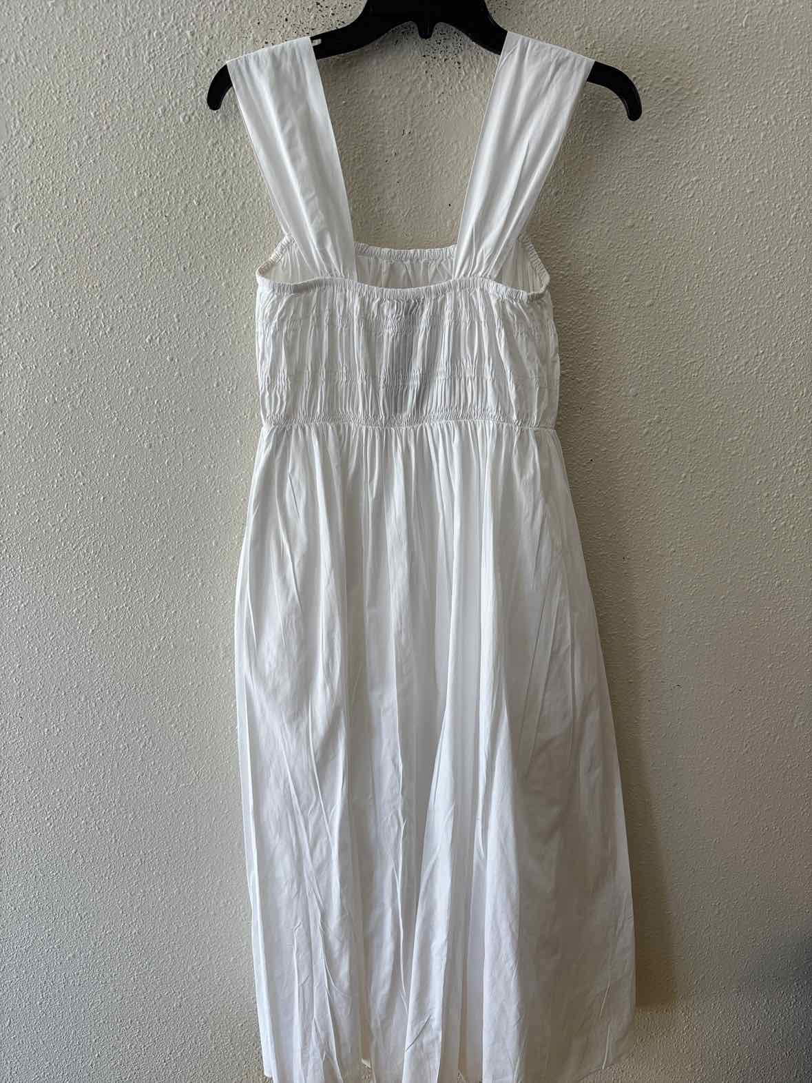 staud white dress Mini Wells while the asymmetrical hem adds an unexpected edge STAUD White Size S Dress