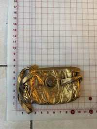 Gucci metallic gold Handbag