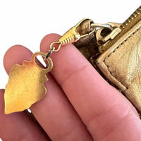 Gucci metallic gold Handbag