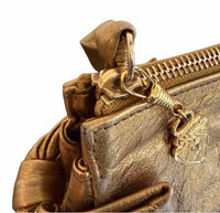 Gucci metallic gold Handbag