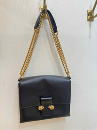 Alexander McQueen Black and Gold Handbag