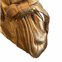 Gucci metallic gold Handbag