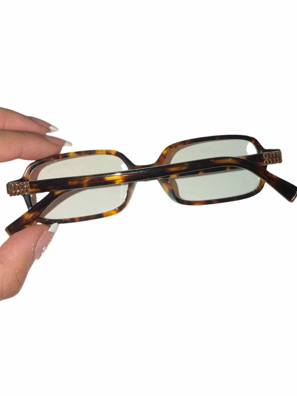 Miu Miu Tortoise Sunglasses