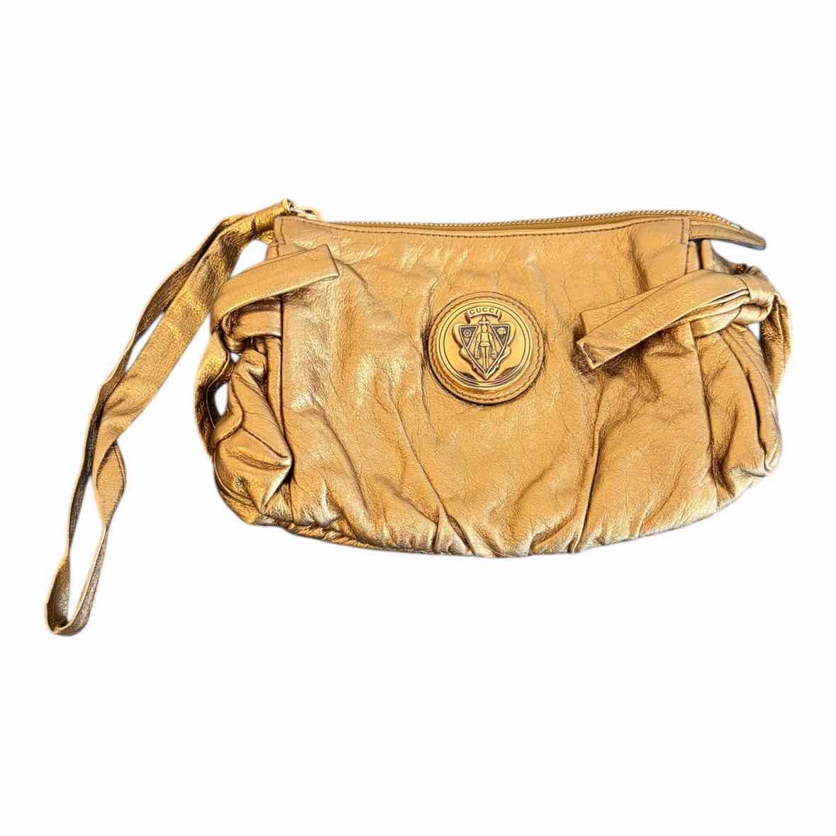 Gucci metallic gold Handbag